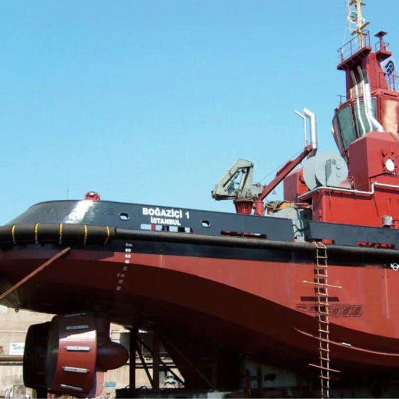 Remolcadores, muelles de caucho y retardadores de dique